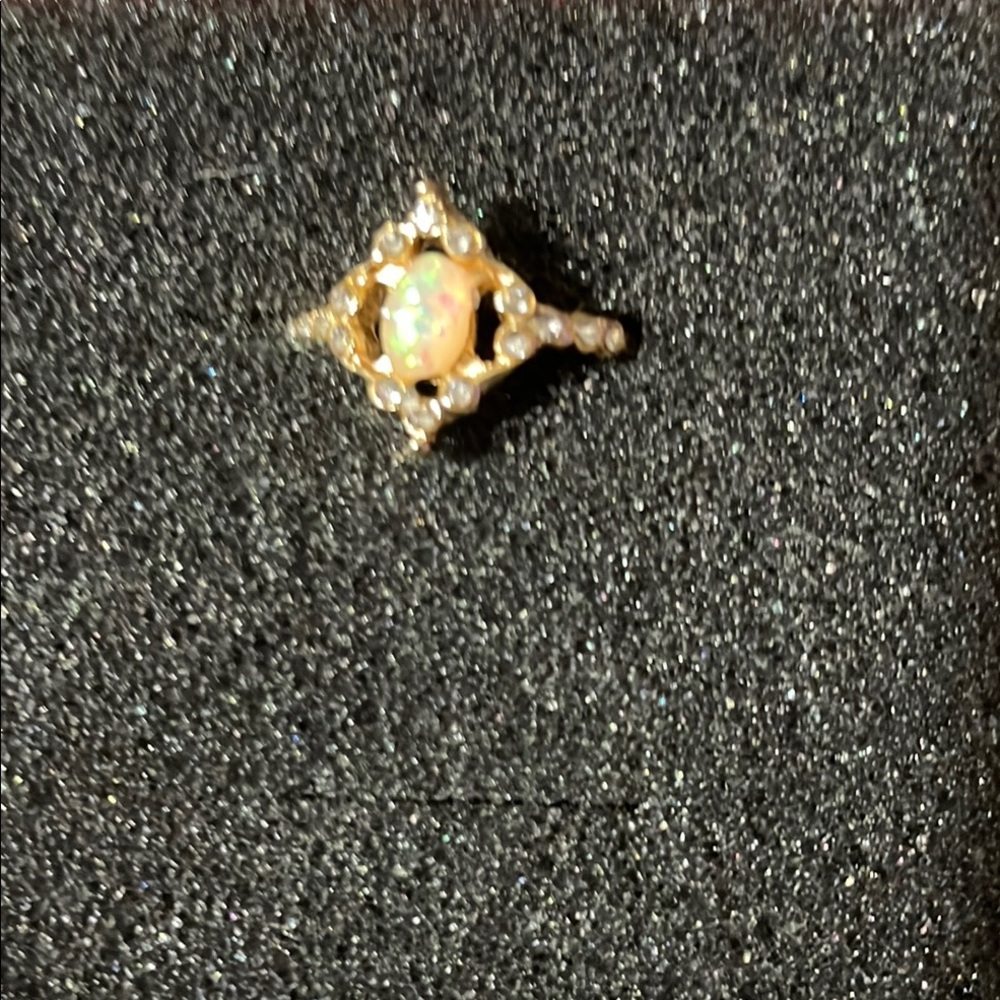 Elegant Golden and Opal Ring